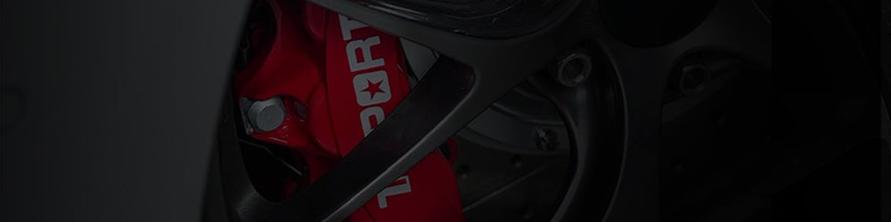 A red TTSPORT Classic Series 6-piston big brake kit.