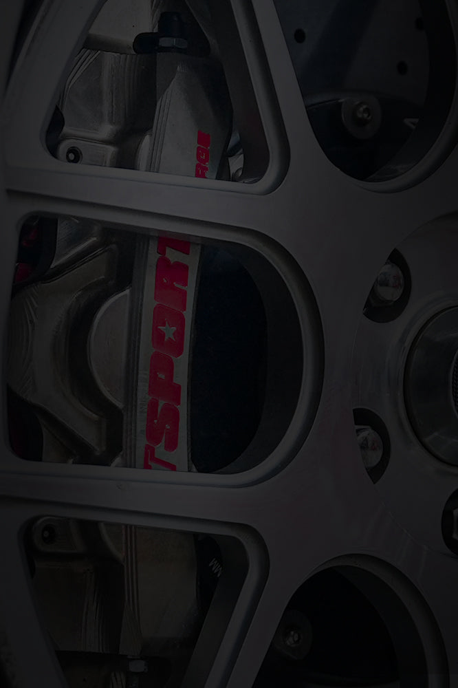 A chrome TTSPORT Mono series 6-piston big brake kit.