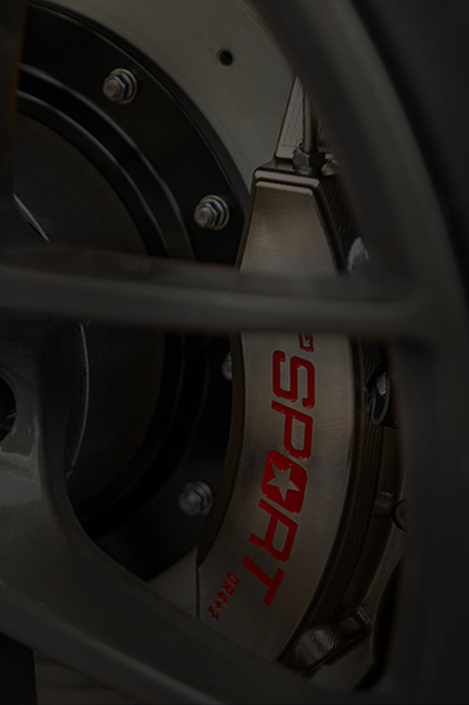 A chrome TTSPORT Racing Series big brake kit.