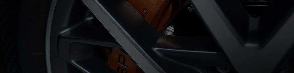 An orange TTSPORT Slim Series 8-piston big brake kit.