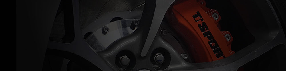 An orange TTSPORT Vehicle-Specific Series 6-piston big brake kit.